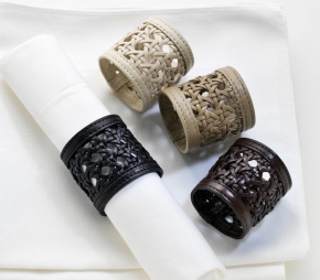      Deluxe.     Colourmix leather napkin rings set by Riviere
